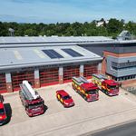 Fire vehicles in front of station taken from above