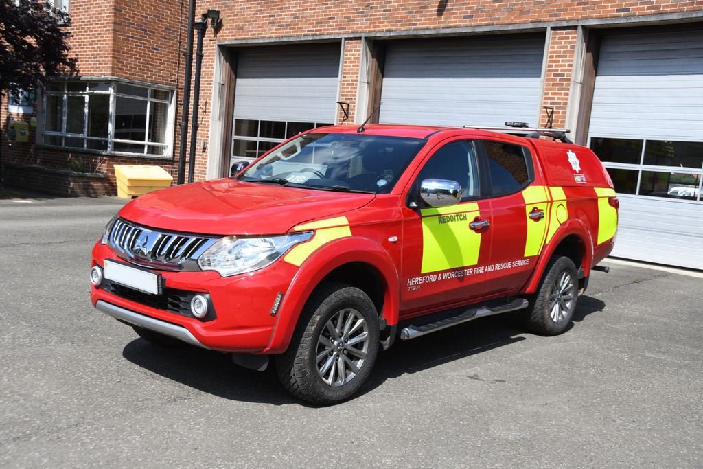 Crew Carrier parked in front of fire station