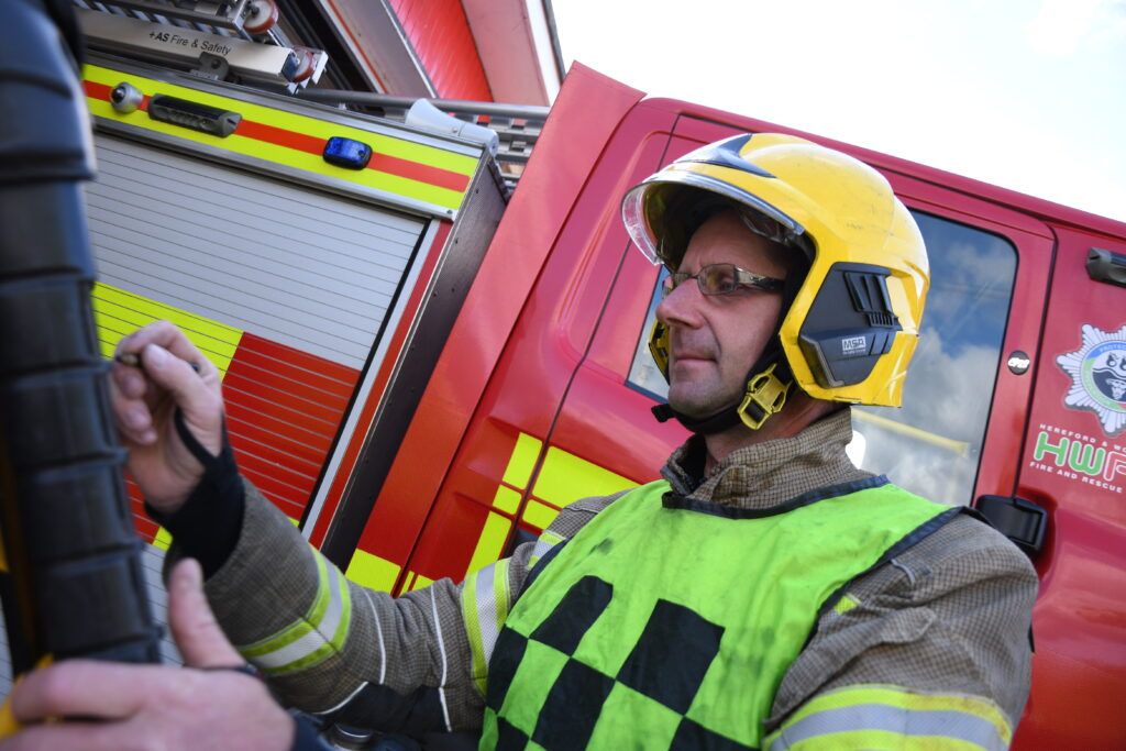 firefighter in helmet at exercise