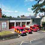 Fire vehicles in front of fire station