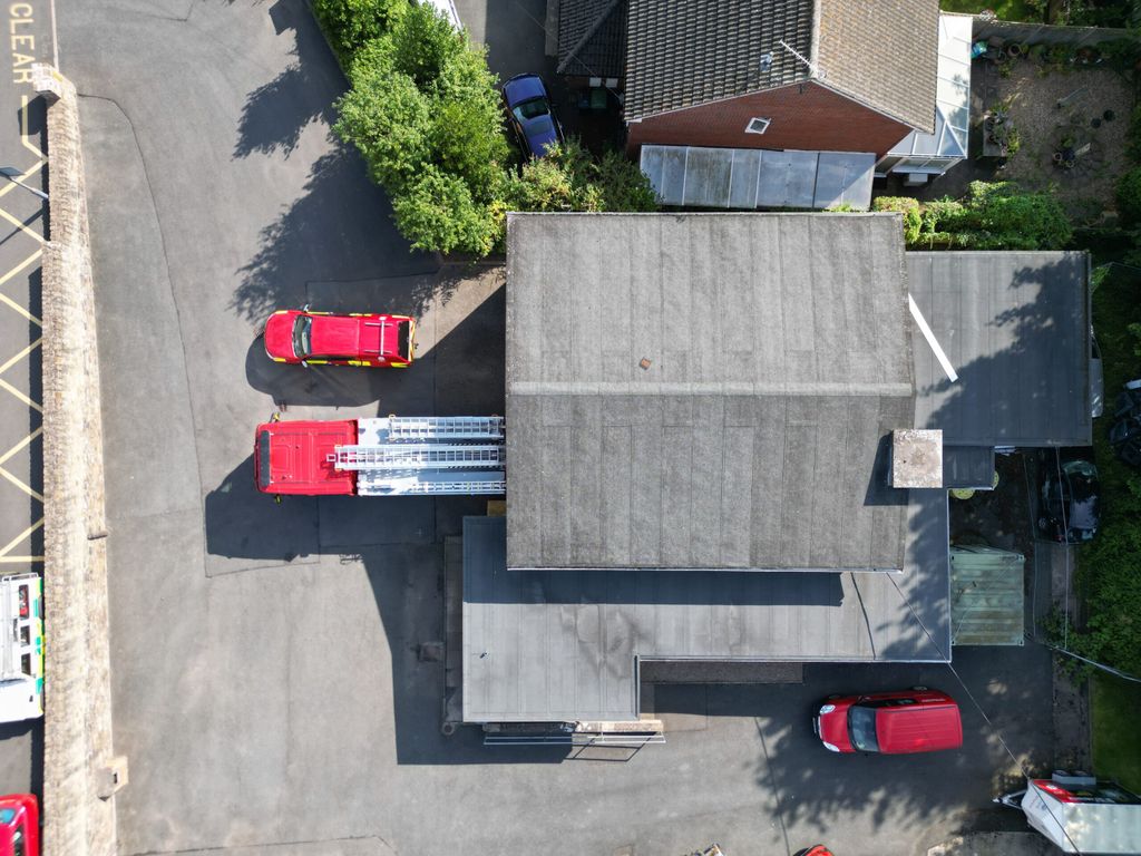 Two fire vehicles taken from directly above station