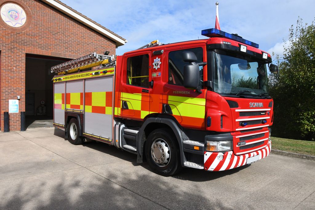 Fire engine in front of fire station