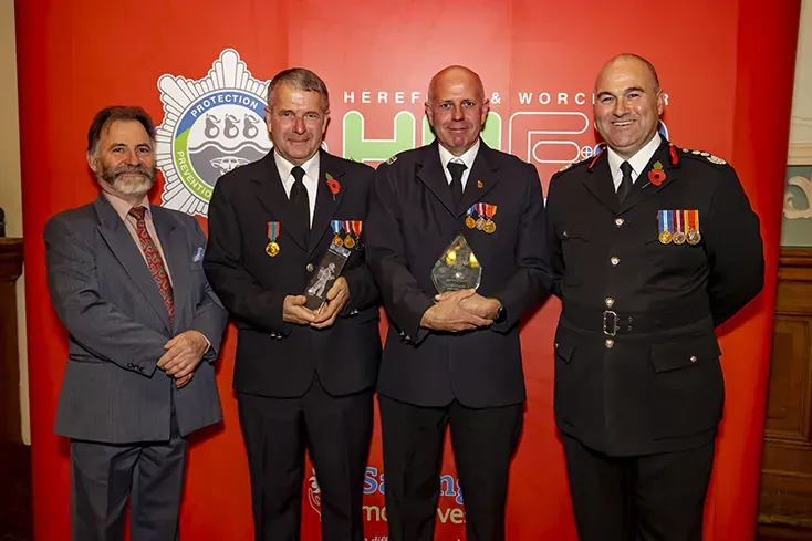 Firefighters receive long service medals at awards ceremony